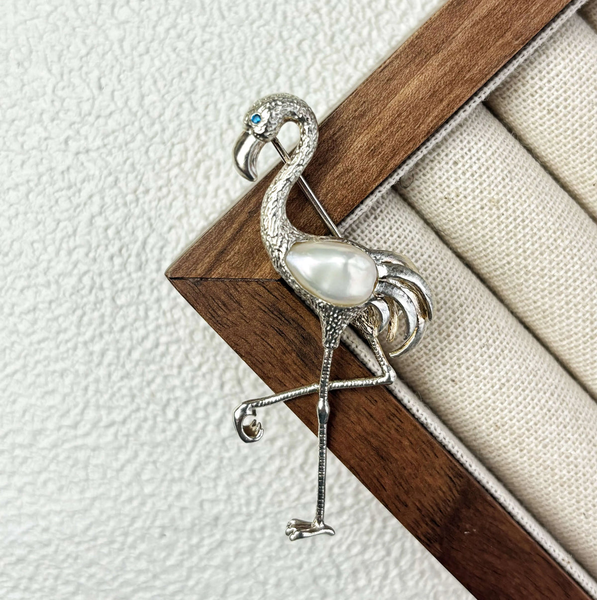 Unique luminous pearl graceful flamingo brooch for women — artisan styling detail