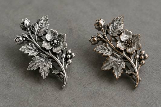 Solid 925 sterling silver piece beside a silver-plated piece with its plating worn through to the brass base