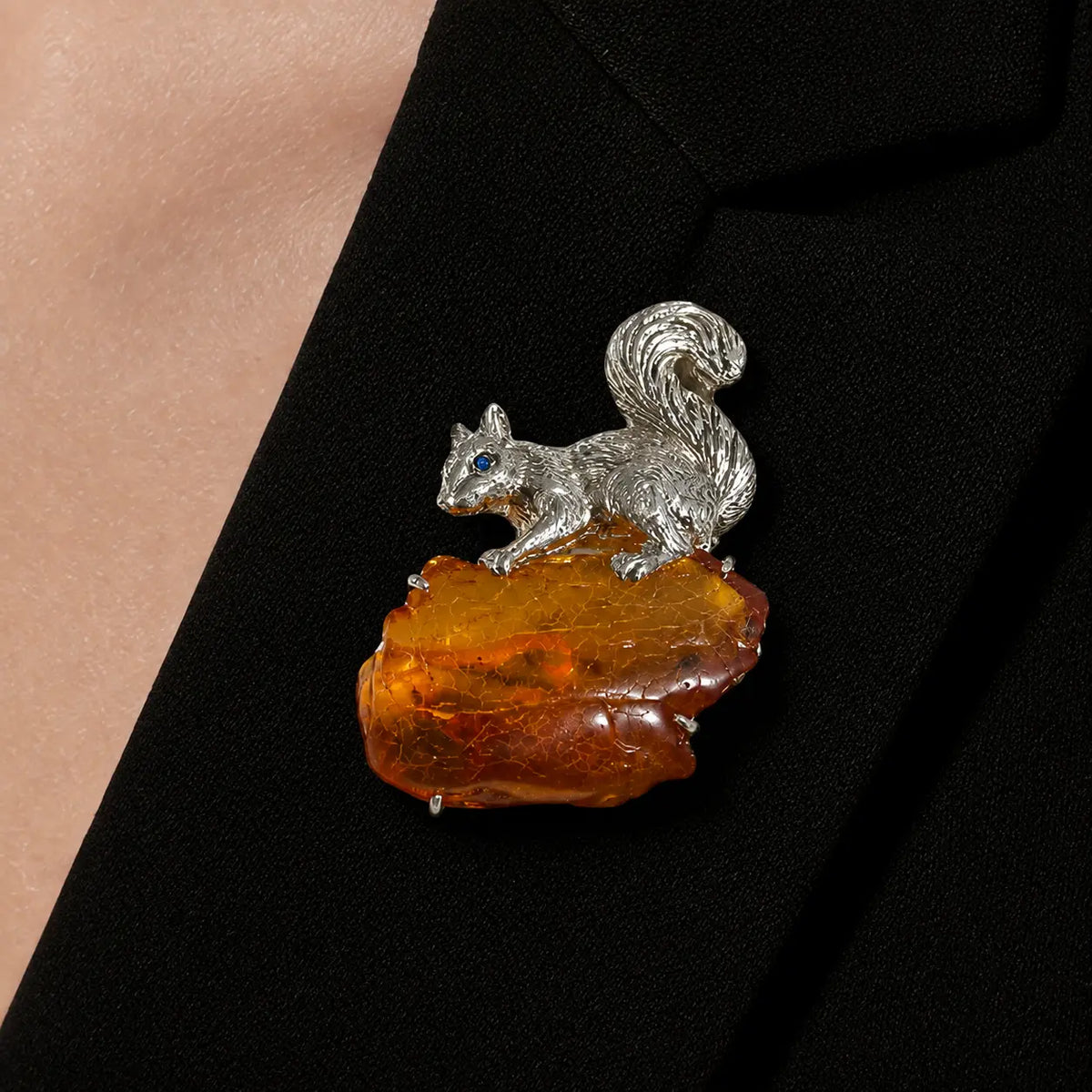 2-in-1 curled-tail squirrel silver brooch and pendant styled on fabric