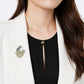 2-in-1 curled leopard silver brooch and pendant styled on fabric