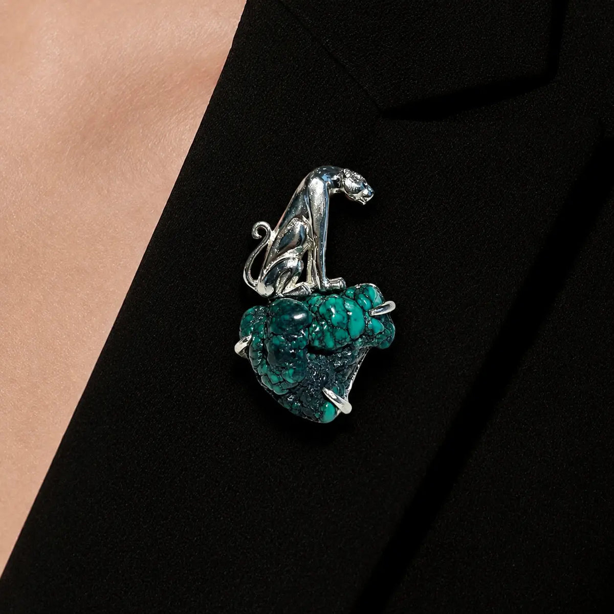 Unique natural turquoise seated leopard brooch for women — artisan styling detail