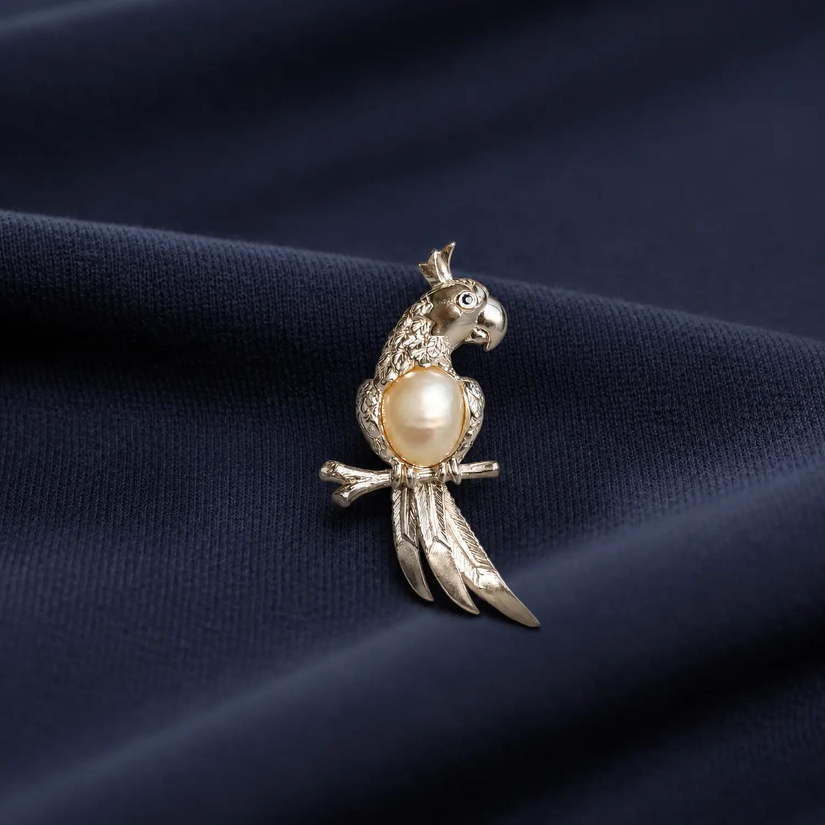 Artisan sterling silver watchful parrot brooch styling detail with baroque pearl body