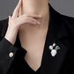 2-in-1 radiant sunflower silver brooch and pendant styled on fabric