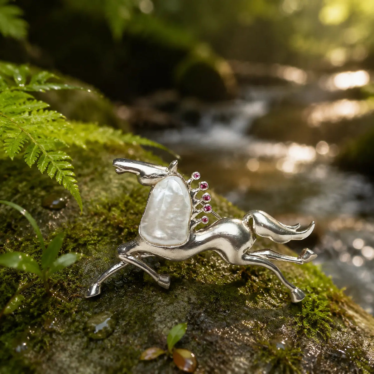 baroque pearl galloping horse silver brooch in a nature-inspired styling photo