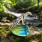 Natural stone brooch with blue flash labradorite — stalking leopard silver brooch styling photo