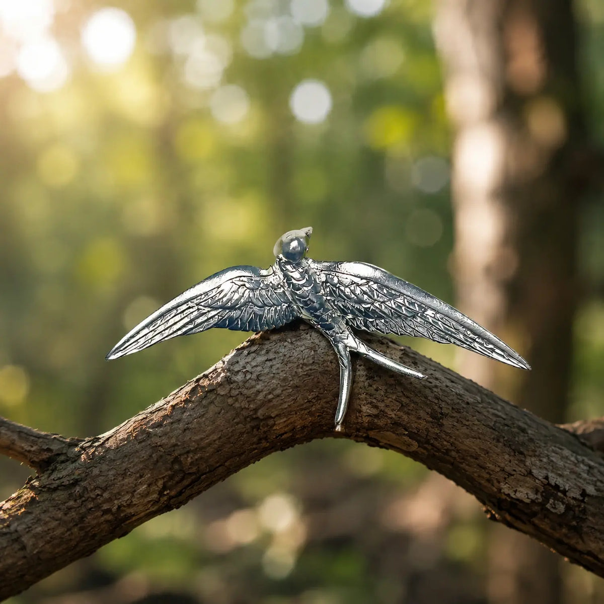 sterling silver flying swallow silver brooch in a nature-inspired styling photo