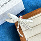 Convertible hovering dragonfly silver pendant and brooch in a styling photo