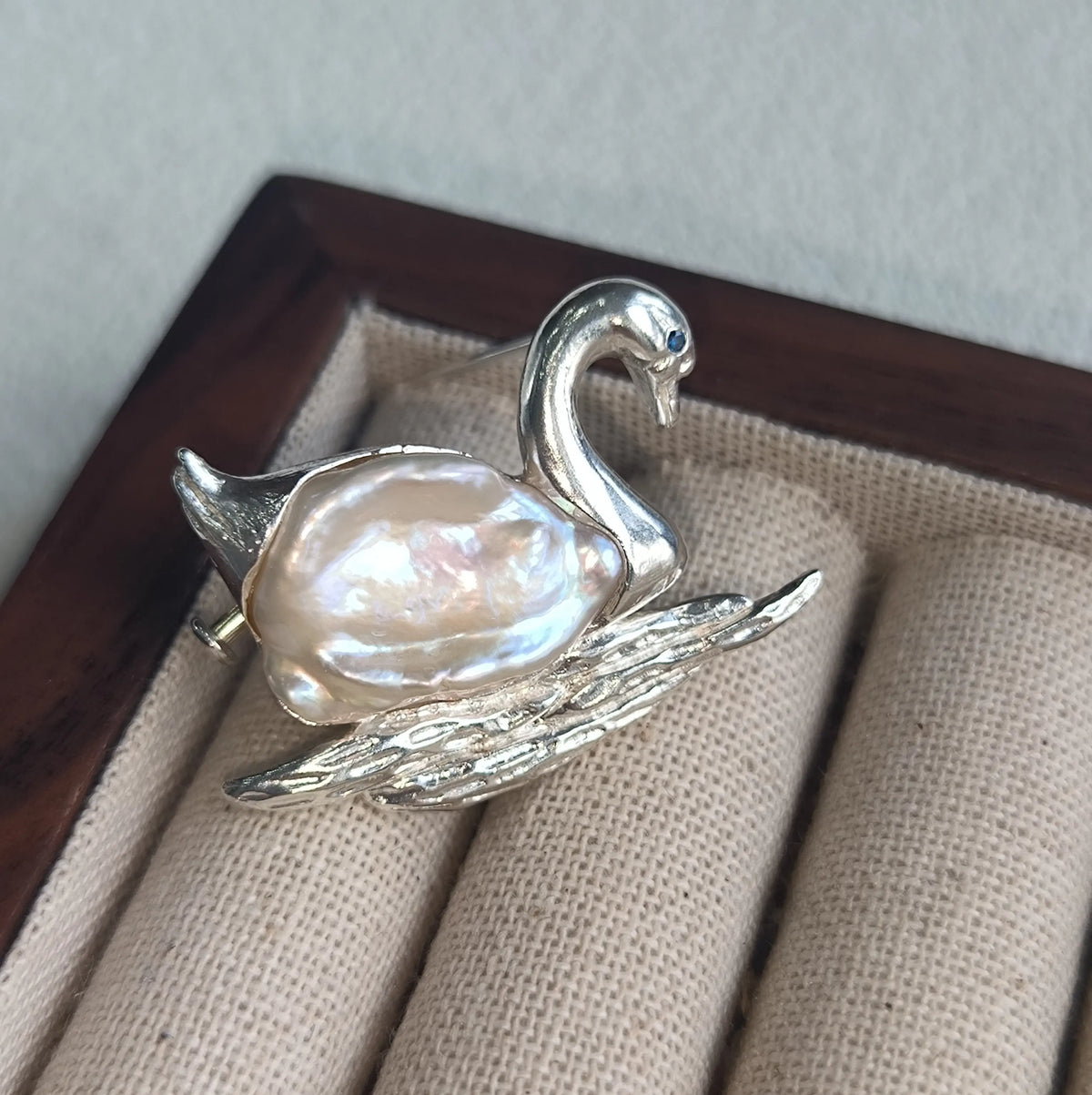 Artisan sterling silver serene swan brooch styling detail with baroque pearl