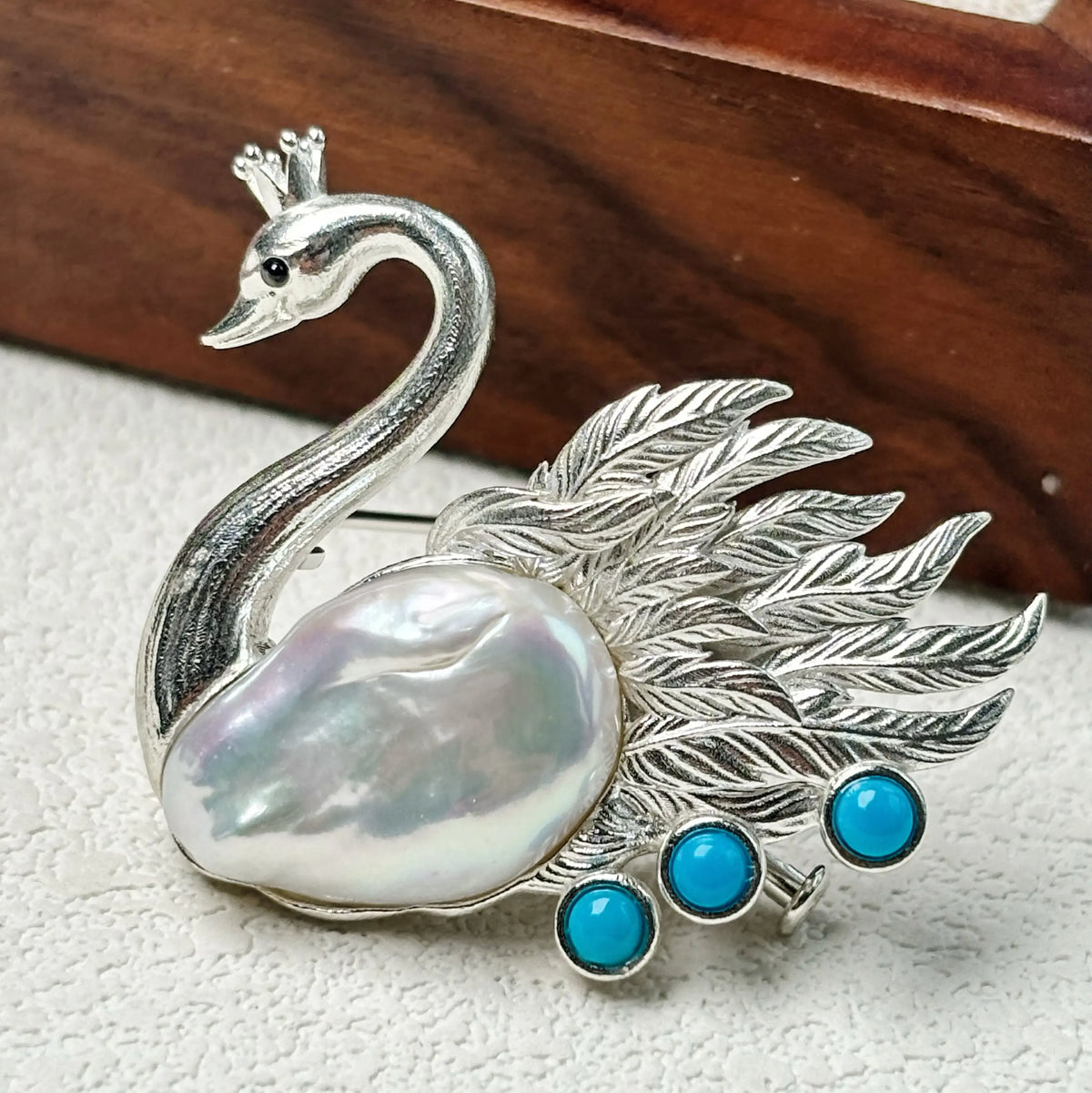 2-in-1 crowned swan silver brooch and pendant styled on fabric
