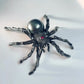 Artisan silver web-spinning spider brooch — handmade jewelry product image