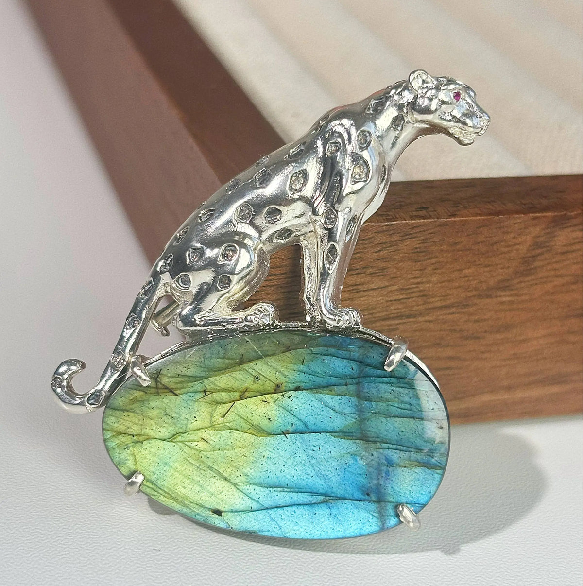 Artisan silver stalking leopard brooch — handmade jewelry product image