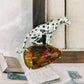Artisan sterling silver prowling leopard brooch styling detail with natural flower amber