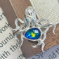 Handmade brooch for women — blue-green enamel curling tentacle octopus silver brooch styling photo