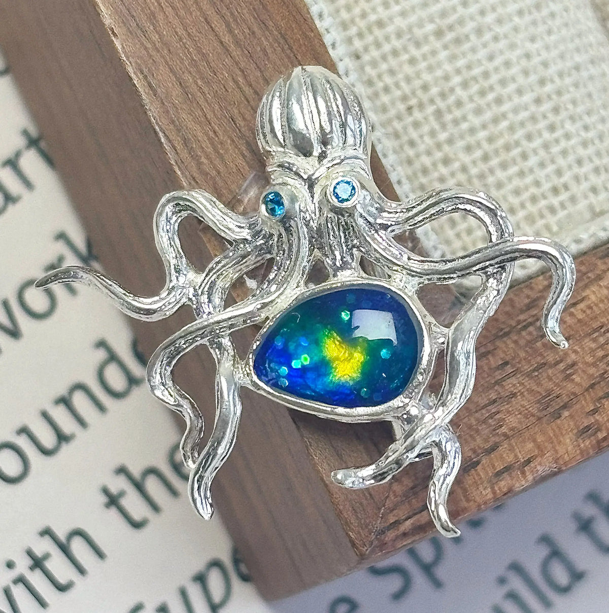 Handmade brooch for women — blue-green enamel curling tentacle octopus silver brooch styling photo