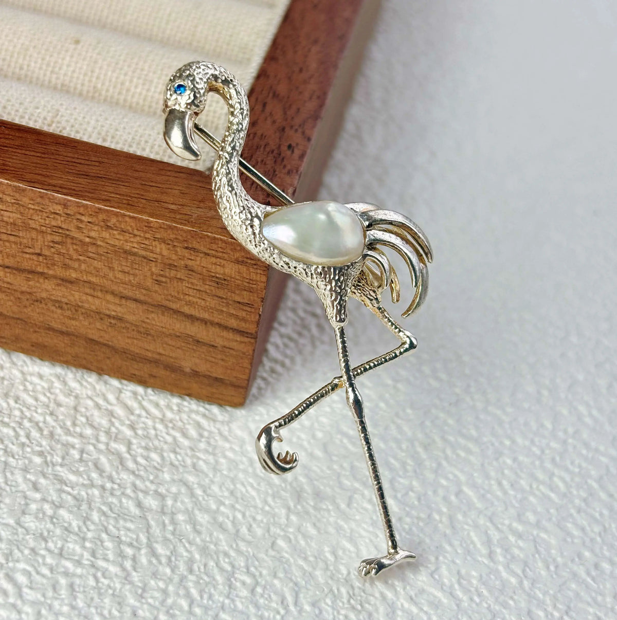Artisan sterling silver graceful flamingo brooch styling detail with luminous pearl