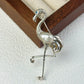 2-in-1 graceful flamingo silver brooch and pendant styled on fabric