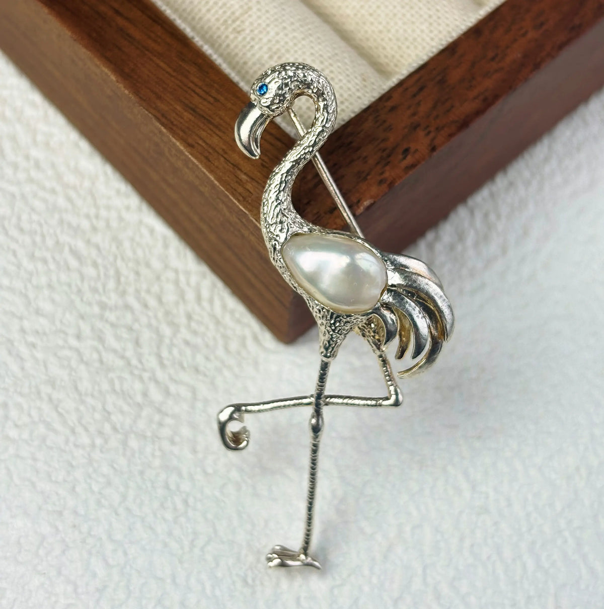 2-in-1 graceful flamingo silver brooch and pendant styled on fabric