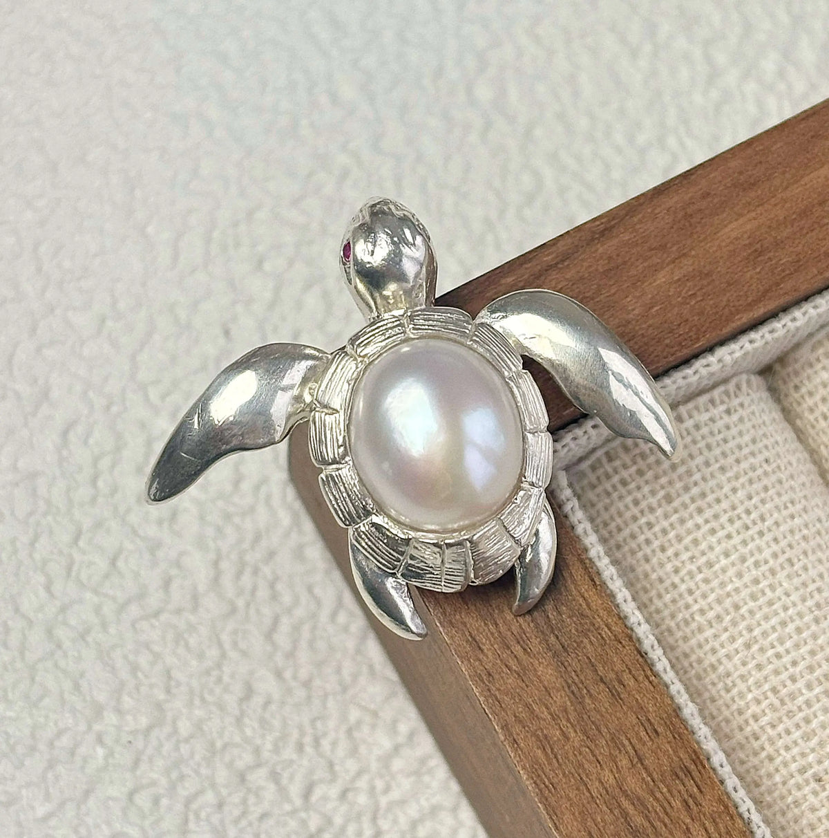 Artisan sterling silver swimming sea turtle brooch styling detail with baroque pearl shell
