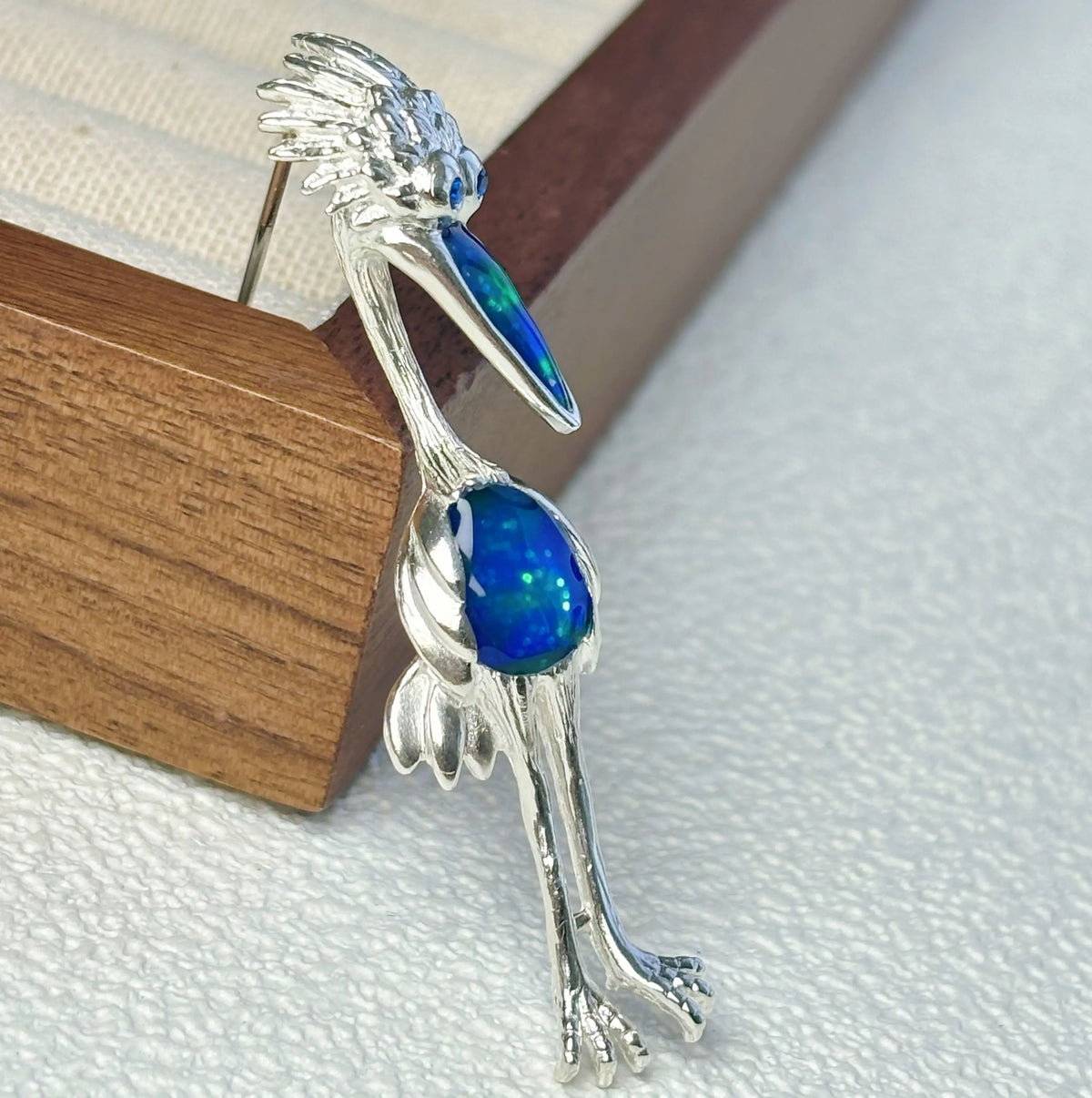 Artisan sterling silver perched owl brooch styling detail with natural banded agate