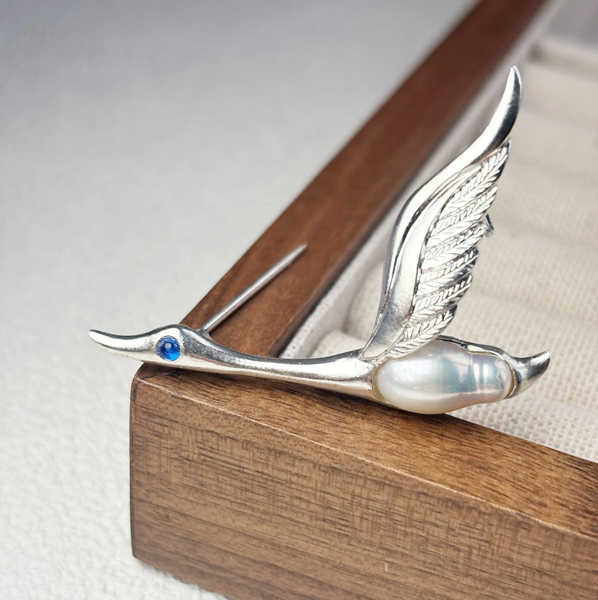 Artisan sterling silver migrating wild goose brooch styling detail with luminous pearl