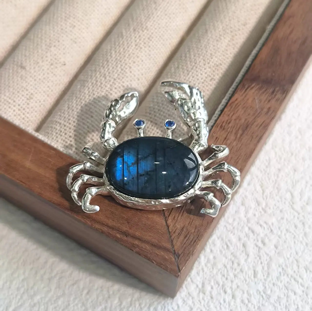 Unique blue-flash labradorite ocean crab brooch for women — artisan styling detail