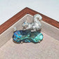 2-in-1 foraging squirrel silver brooch and pendant styled on fabric
