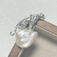 Artisan sterling silver crouching leopard brooch styling detail with baroque pearl