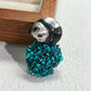 Convertible serene panda silver pendant and brooch in a styling photo