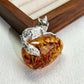 2-in-1 resting fox silver brooch and pendant styled on fabric