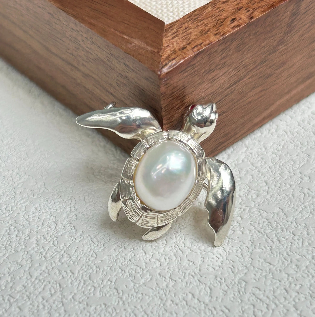 Artisan silver swimming sea turtle brooch — handmade jewelry product image