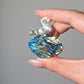 Artisan silver foraging squirrel brooch — handmade jewelry product image