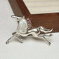 Artisan sterling silver galloping horse brooch styling detail with baroque pearl