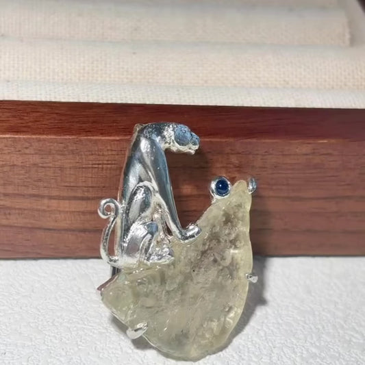 Product video: handmade silver curled leopard brooch and convertible pendant